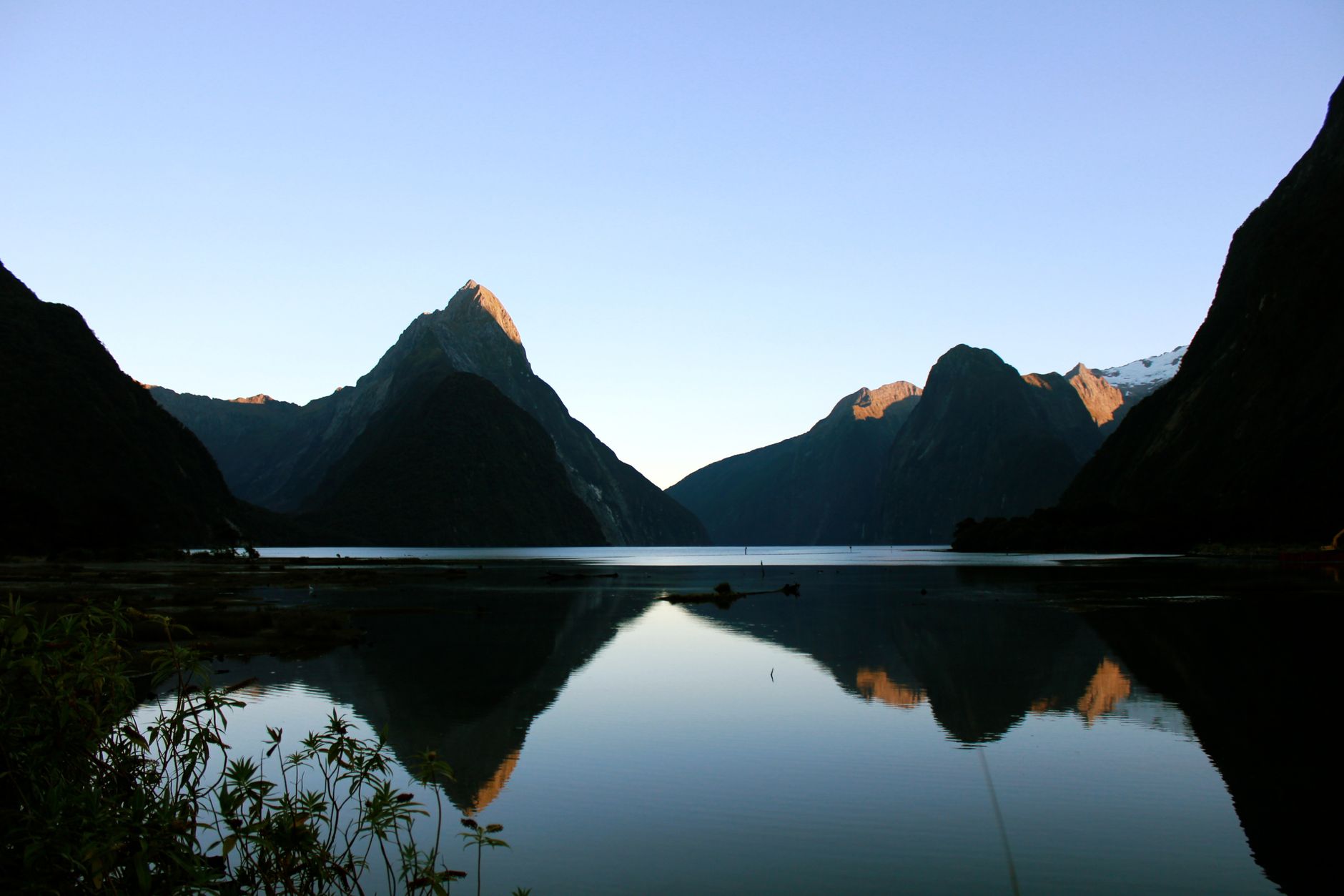 Stunning fjord landscape of Milford Sound New Zealand with glowing sunlight